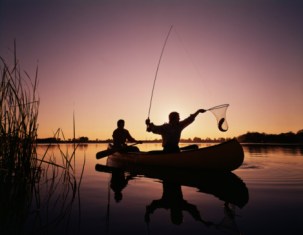 sunset canoe fishing